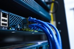 Fiber Optic vs. Copper: Why Your Warehouse Needs a High-Speed Backbone in 2026