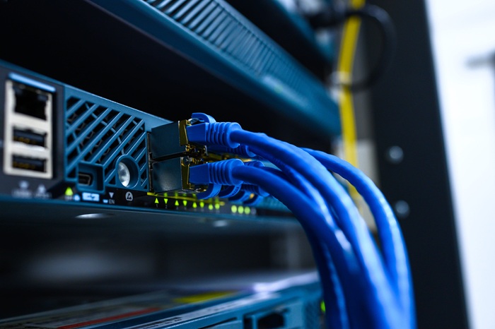 Fiber Optic vs. Copper: Why Your Warehouse Needs a High-Speed Backbone in 2026 Image